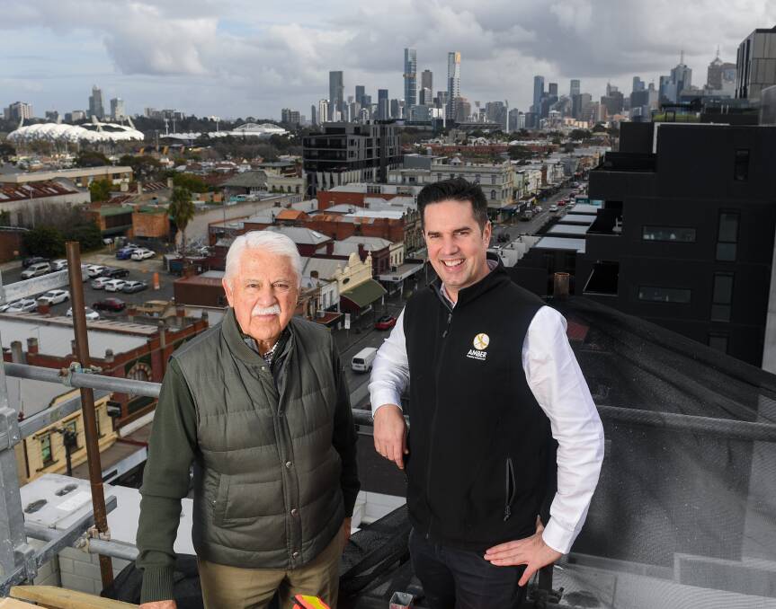 Amber Property Group's Geoff Brady and COO Jevan Clay atop the company's new 81-room luxury hotel in Bridge Rd. Photo Morgan Hancock